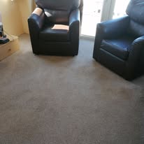 Armchairs and clean carpet